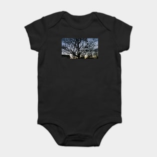 London Eye view thru trees near it Baby Bodysuit